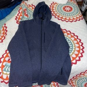 Blue North Face zip up hoodie. Size: Large